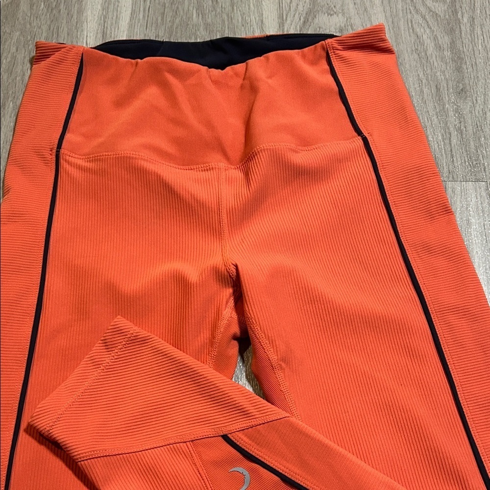 Stylish Orange Leggings with Black Trim - Picture 4 of 10